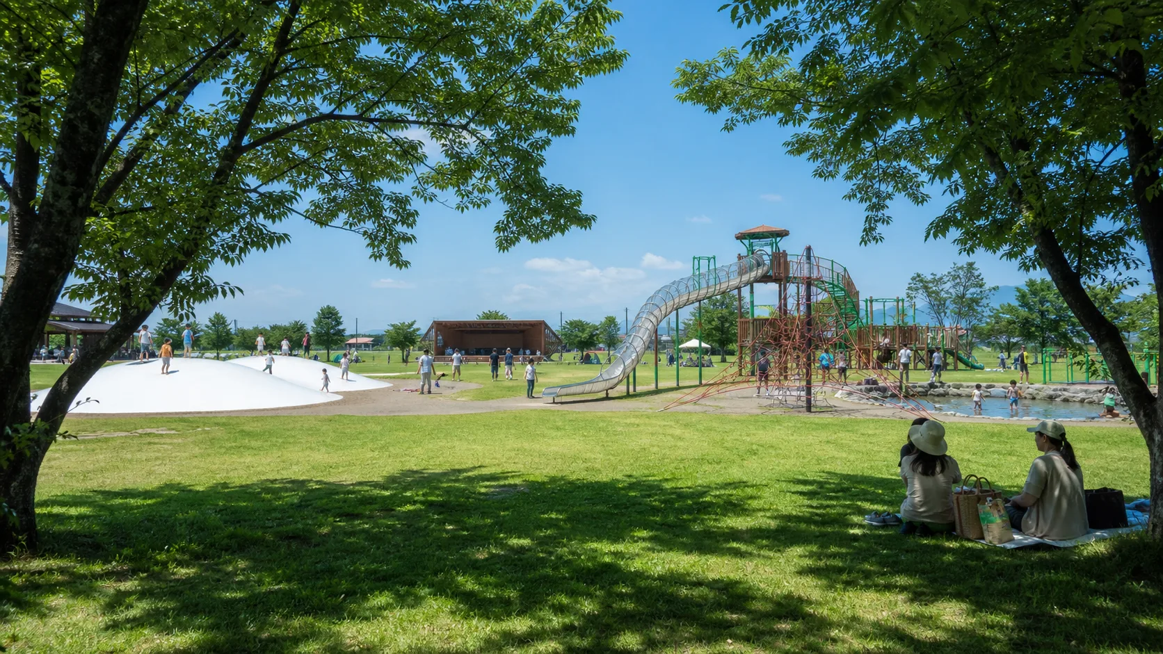 ぴかる広場の遊具と芝生を表す写真調イメージ